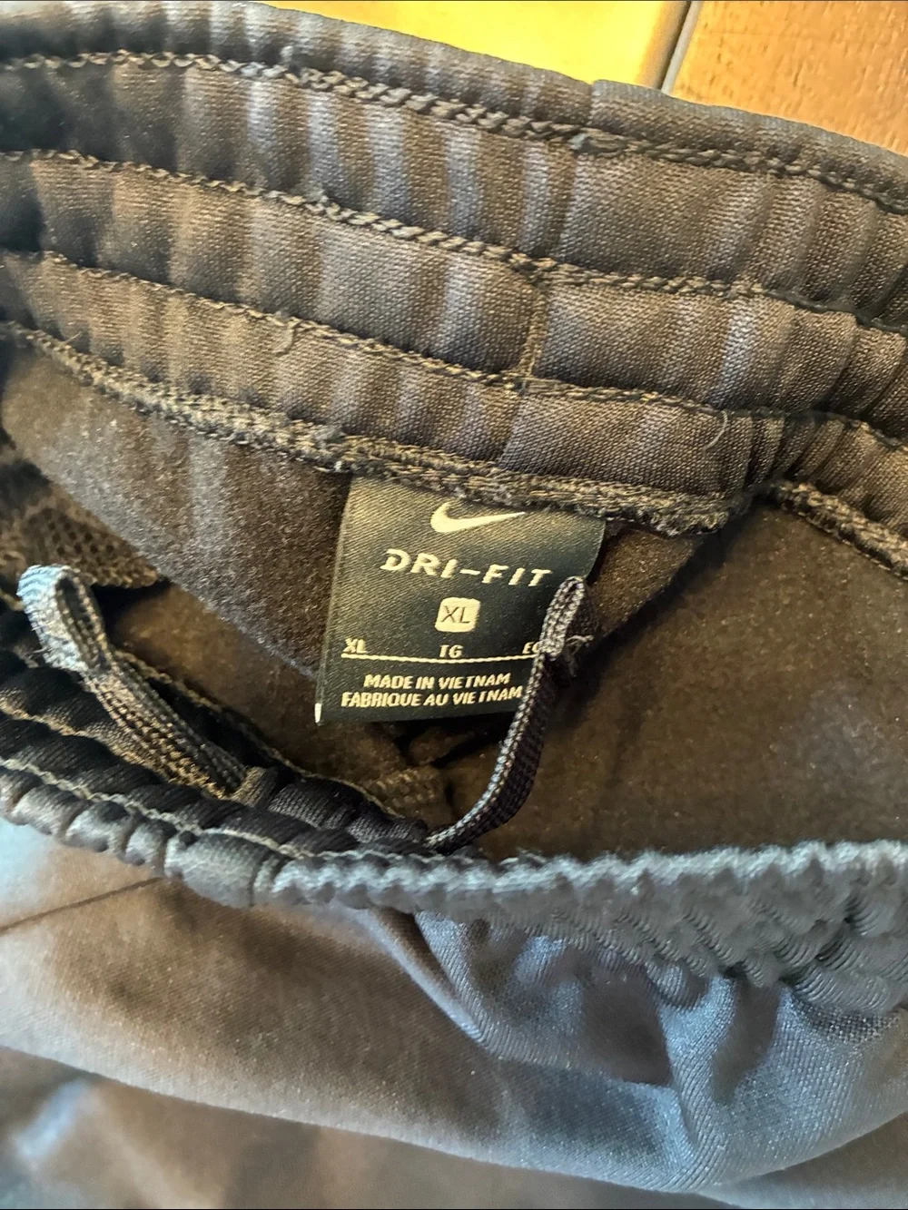 4 pair Nike, Under Armor, Old Navy yxl Black and Gray Joggers